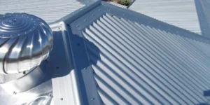 A photo of a shiny new roof, looking from above - one of the expert roofing services provided by MTEC Roofing & Guttering. 